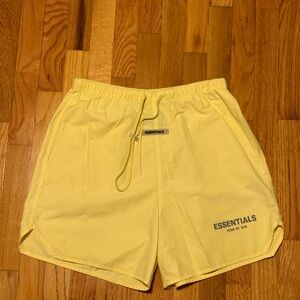 Fear of God Essentials Canary Yellow Volley Shorts Size Small [USED]